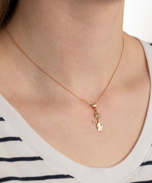 Gold pendant with zircons "cat"