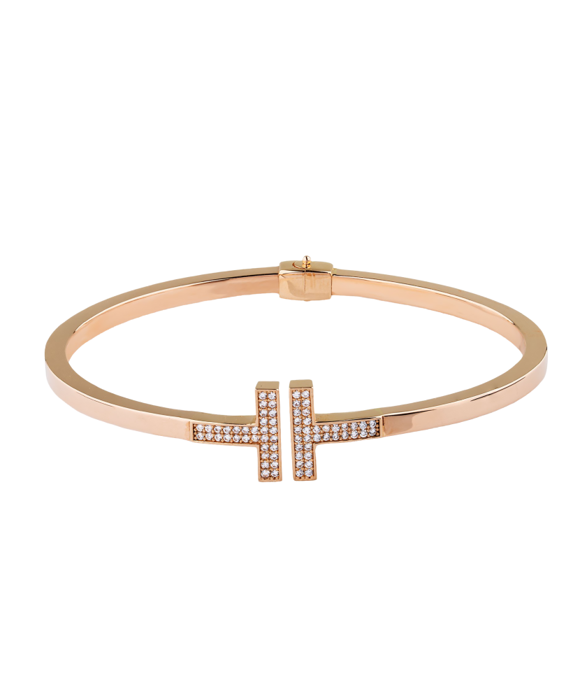 Gold hard bracelet with zircons