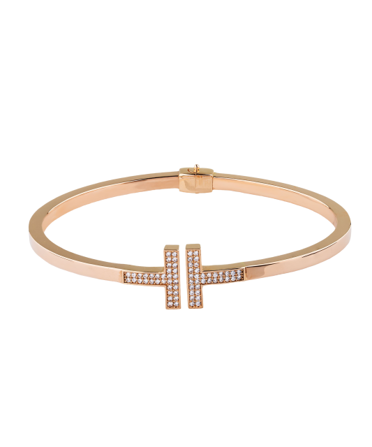 Gold hard bracelet with zircons