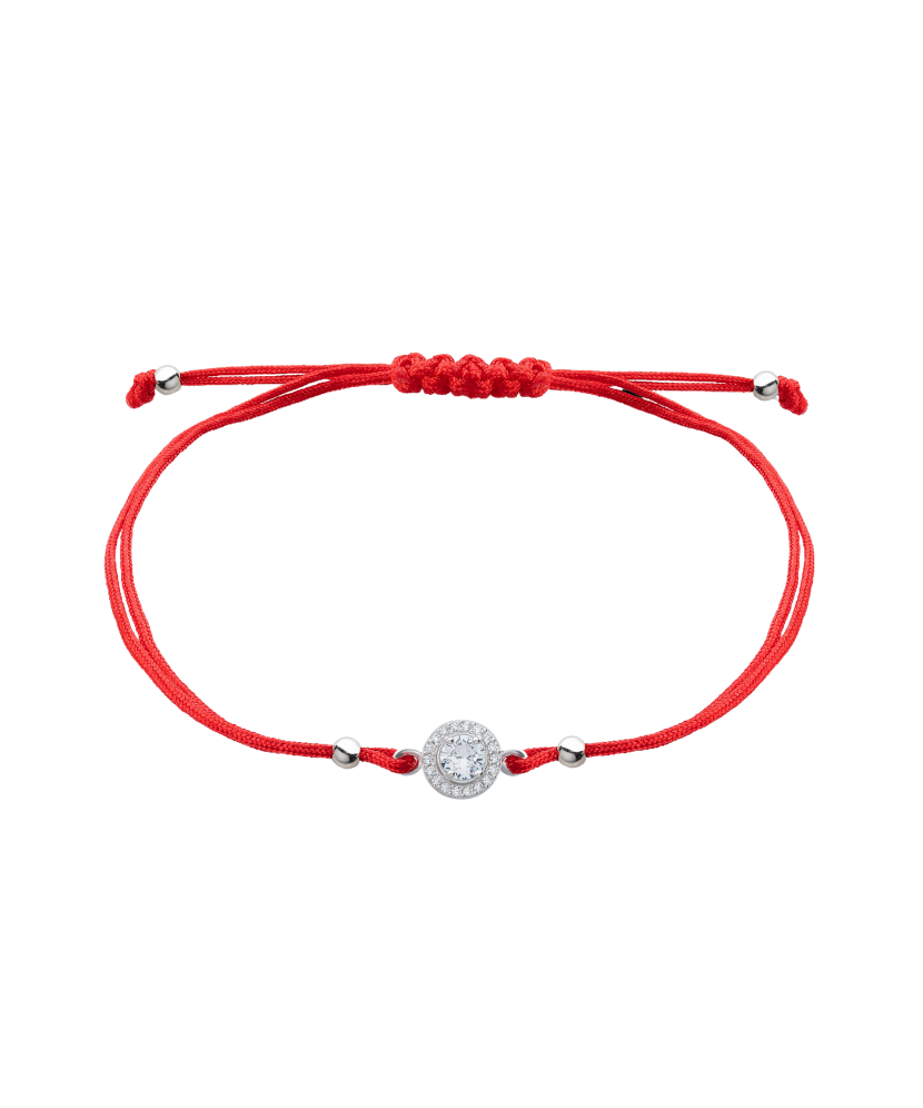 Red string bracelet with a silver pendant with zirconium
