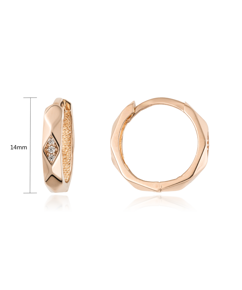 Kultaiset korvakorut zirkoneilla