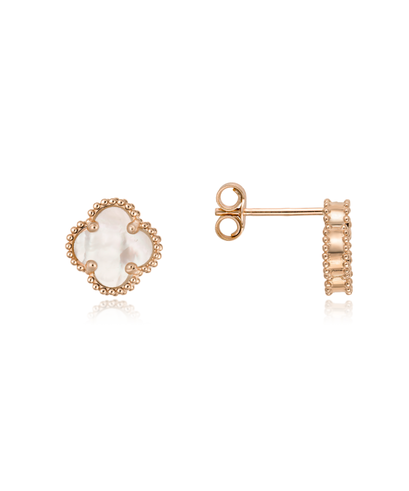 Kultaiset korvakorut helmiäisvärillä