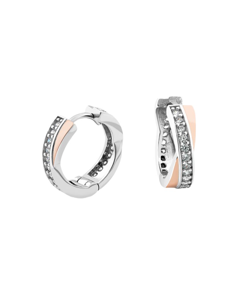 Hopeiset korvakorut peittää kullalla zirkoneilla