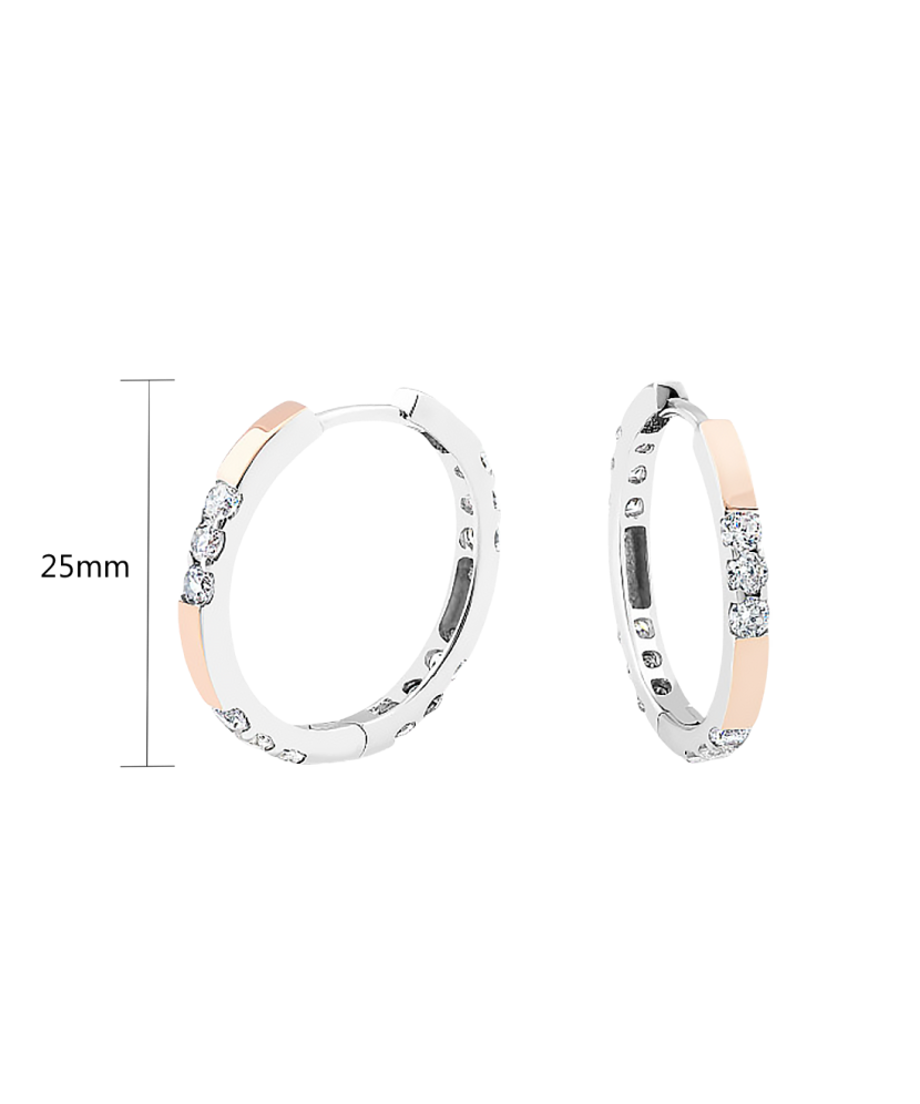 Hopeiset korvakorut peittää kullalla zirkoneilla