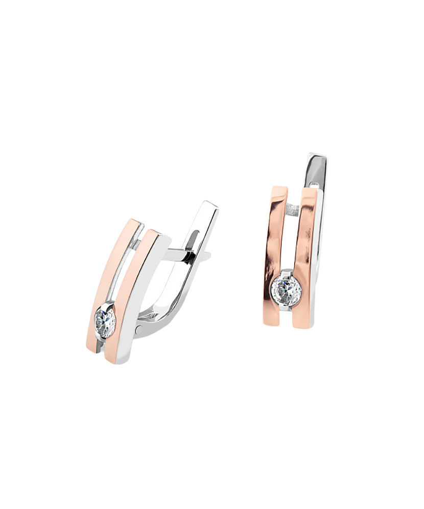 Hopeiset korvakorut peittää kullalla zirkoneilla