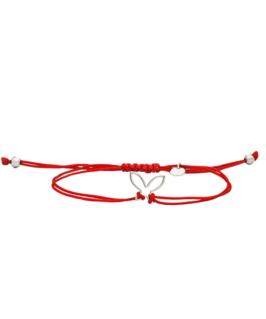 Red string bracelet with a silver pendant