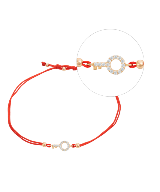 Red string bracelet with a gold pendant and zirconium