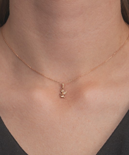 Gold pendant with zircons "angel"