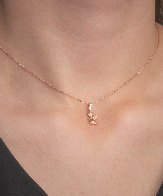 Gold pendant with zircons "angel"