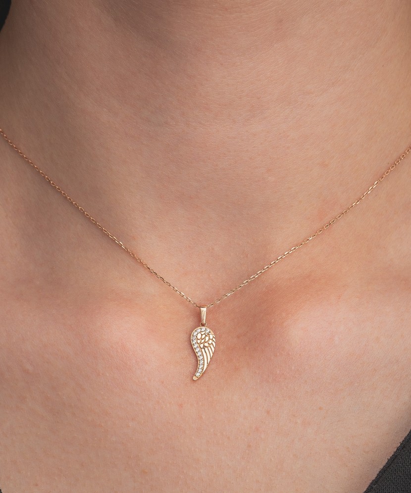 Gold pendant with zircons "Angel Wing"