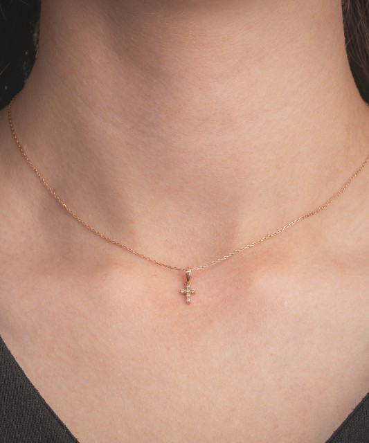 Gold pendant with zircons "cross"