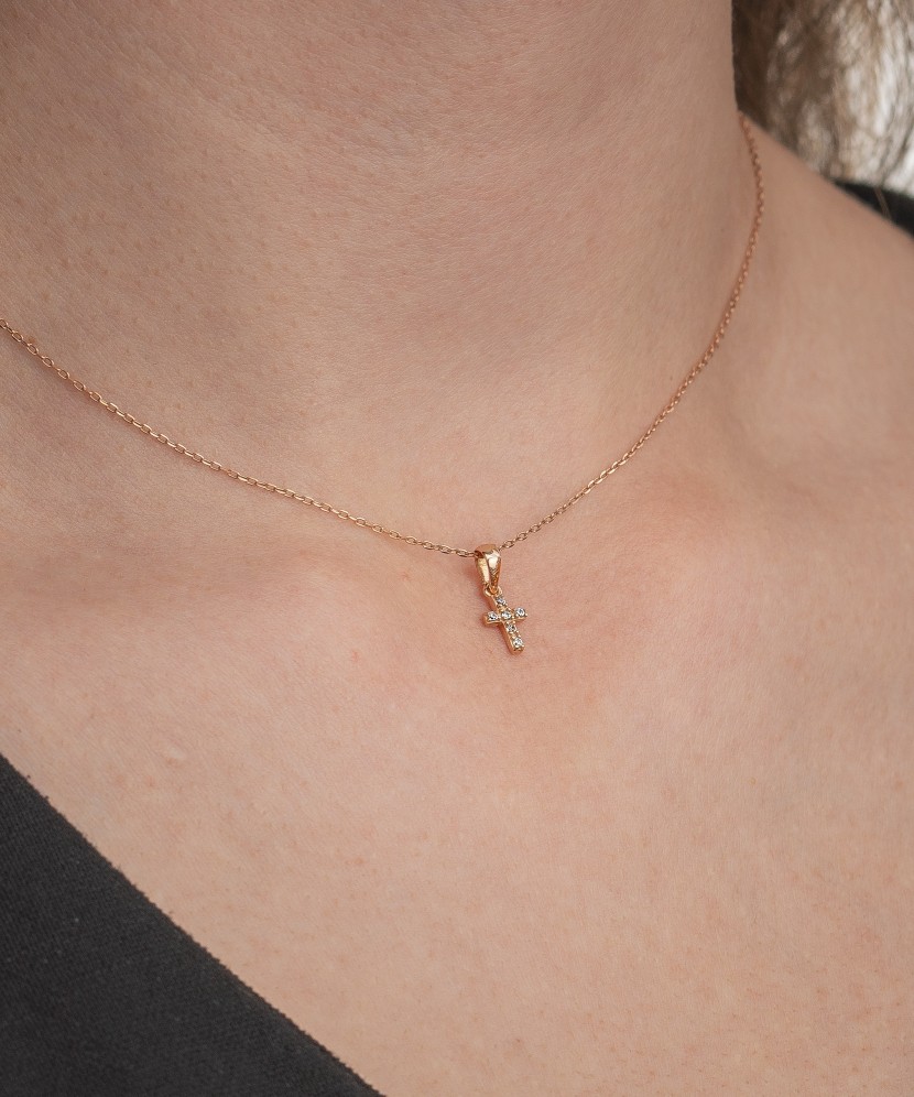 Gold pendant with zircons "cross"