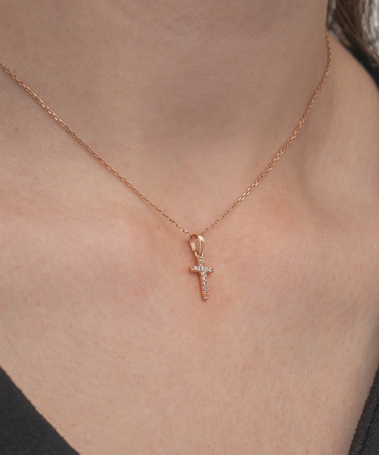 Gold pendant with zircons "cross"