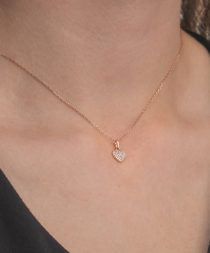 Gold pendant with zircons "heart"