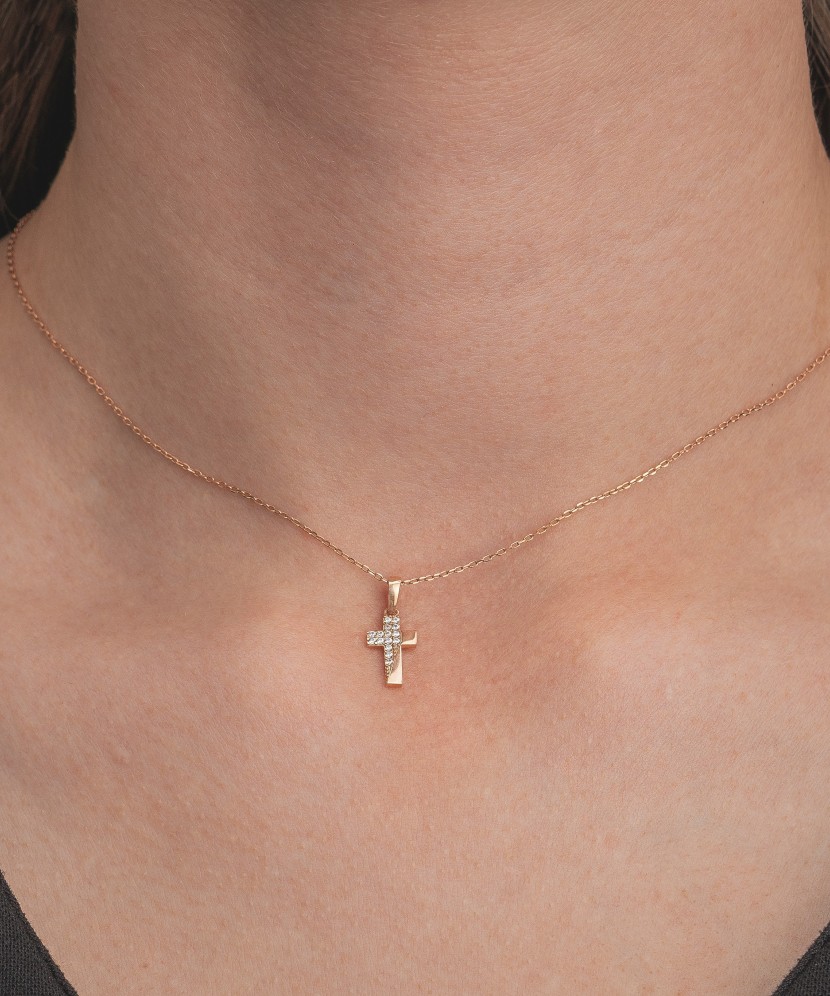 Gold pendant with zircons "cross"