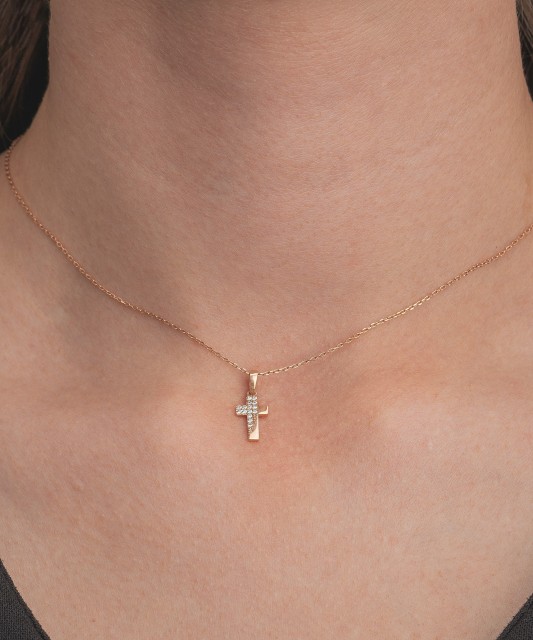 Gold pendant with zircons "cross"
