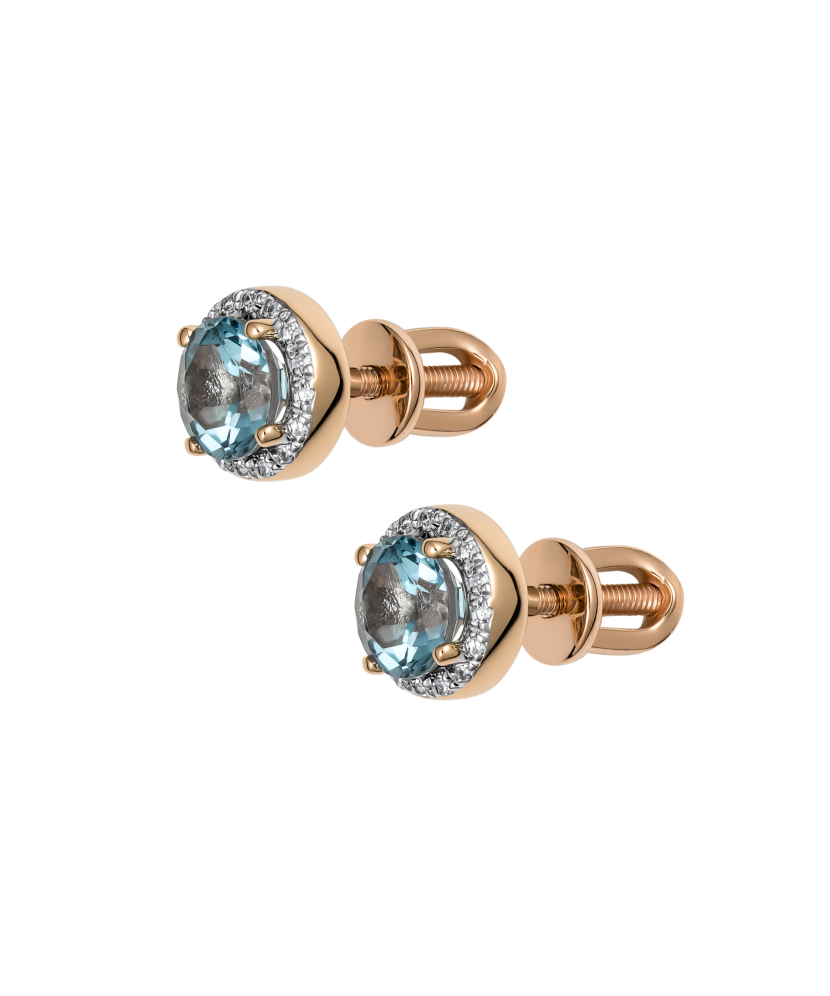 Kultaiset korvakorut timanteilla ja topaseilla