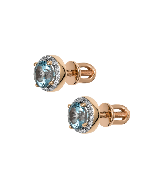 Kultaiset korvakorut timanteilla ja topaseilla