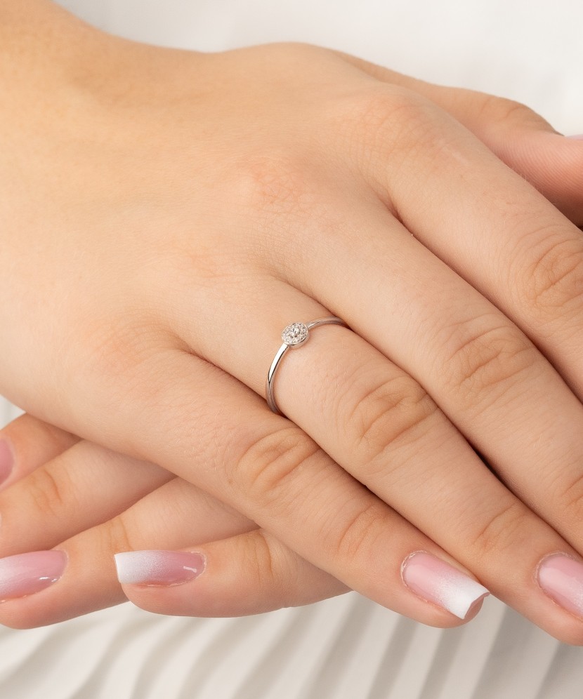 White gold ring with zircons