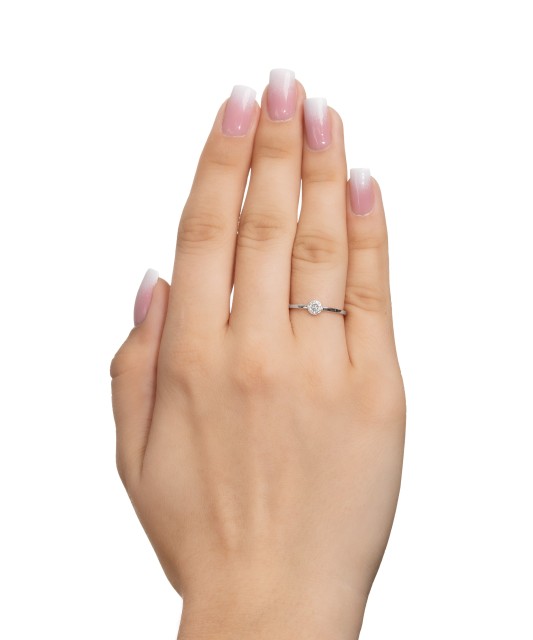 White gold ring with zircons