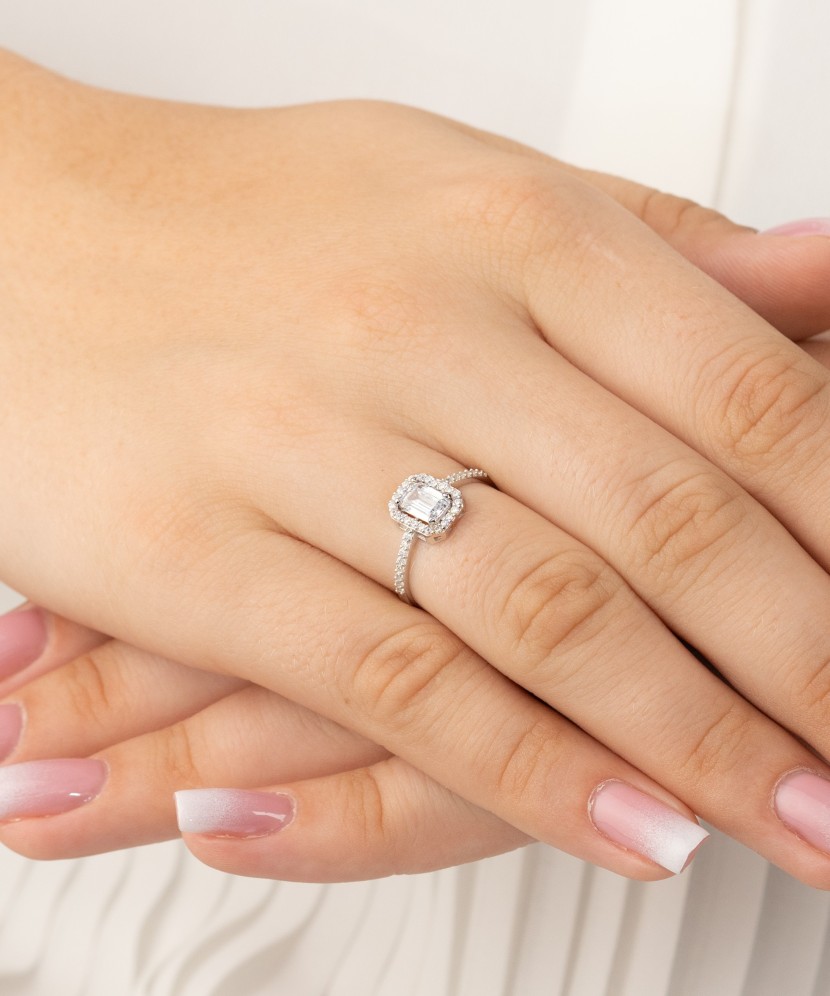 White gold ring with zircons