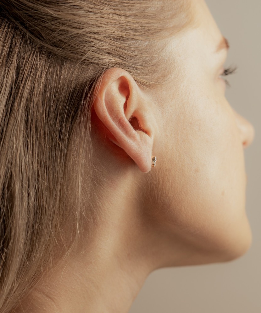 Gold earrings with diamonds and clear topaz