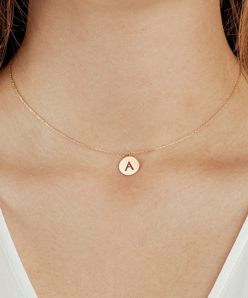 Gold chain with pendant letter A