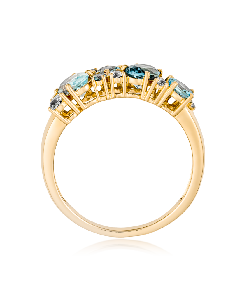 Yellow gold ring with diamonds and topazes