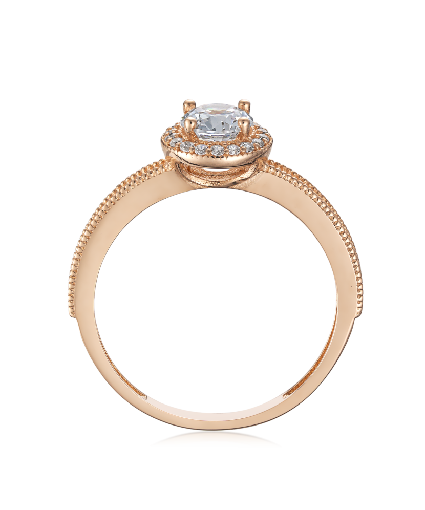 Gold ring with zircons