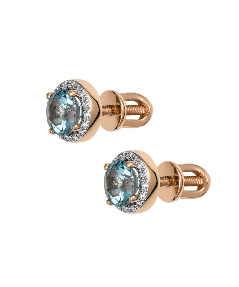 Kultaiset korvakorut timanteilla ja topaseilla