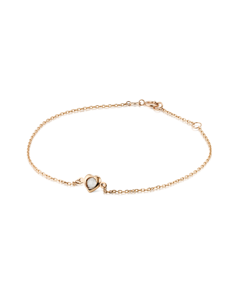 Kultainen rannekoru zirkonailla