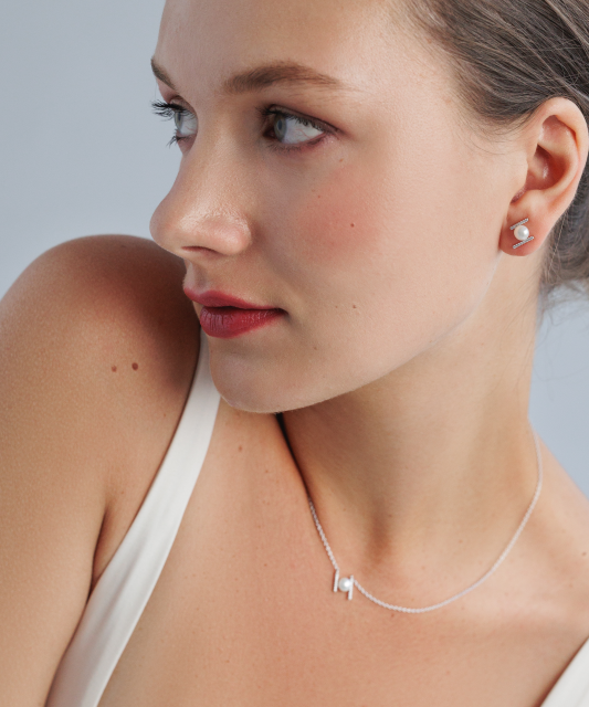 Sterling silver earrings with pearls and zircons