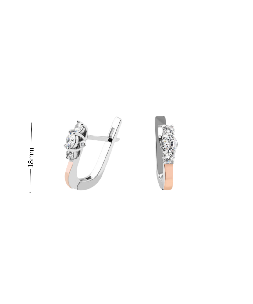 Hopeiset korvakorut peittää kullalla zirkoneilla