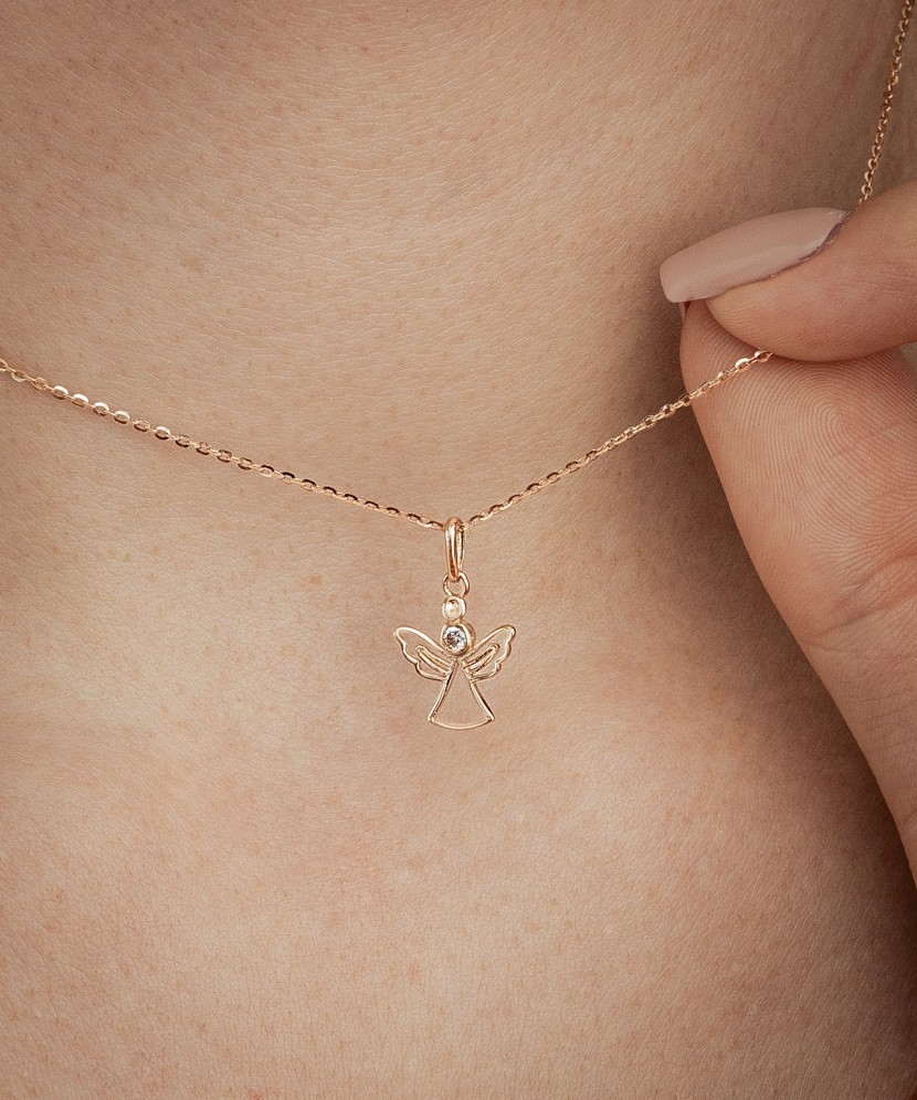 Gold pendant with zirconium "angel"