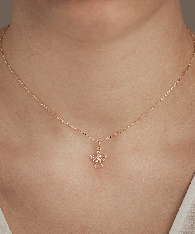 Gold pendant with zirconium "angel"