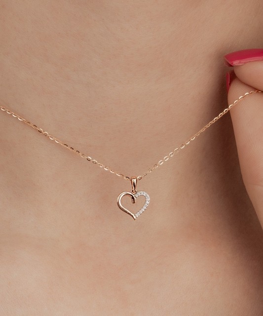 Gold pendant with diamonds "heart"