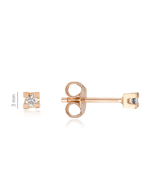 Kultaiset korvakorut timanteilla