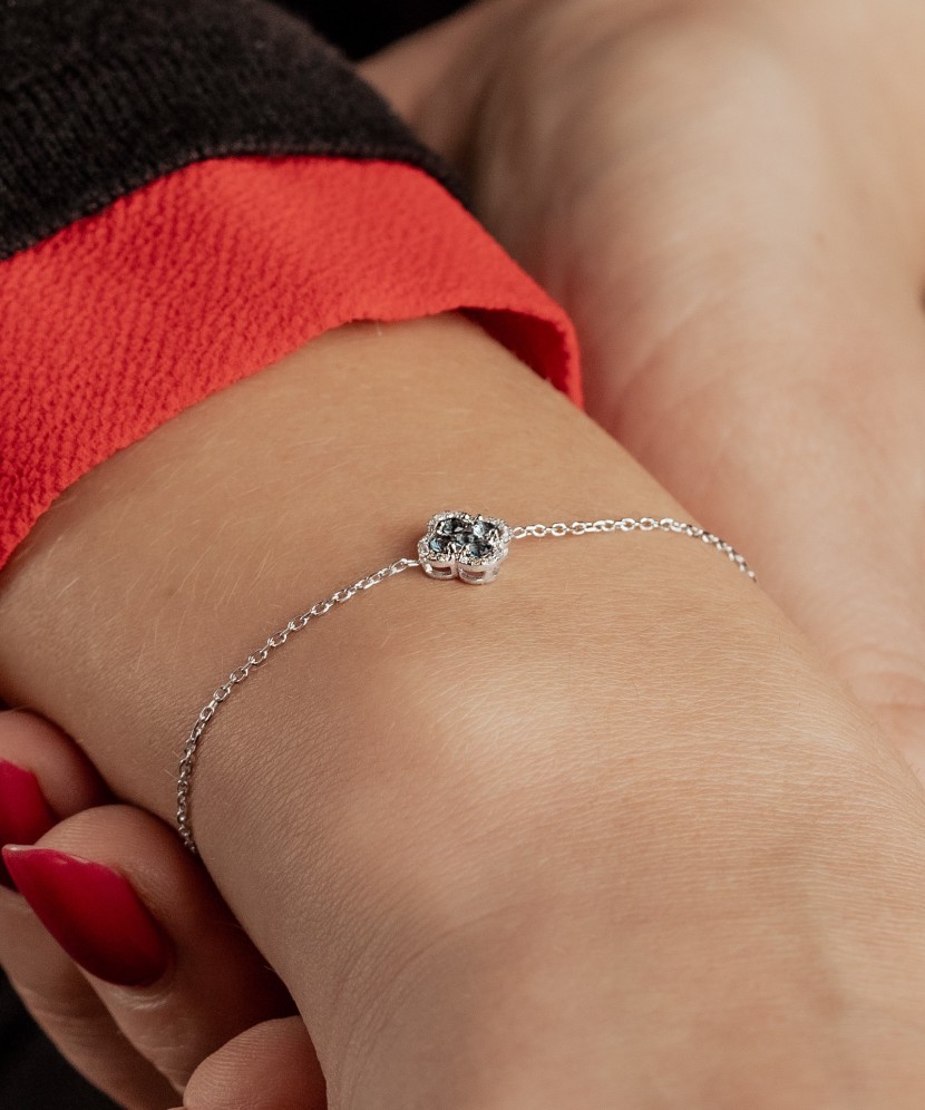 White gold bracelet with diamonds and London topaz