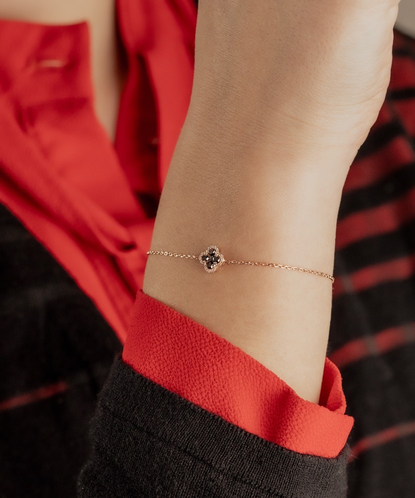 Gold bracelet with black diamonds