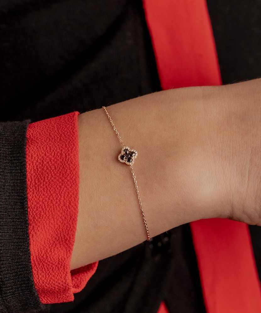 Gold bracelet with black diamonds