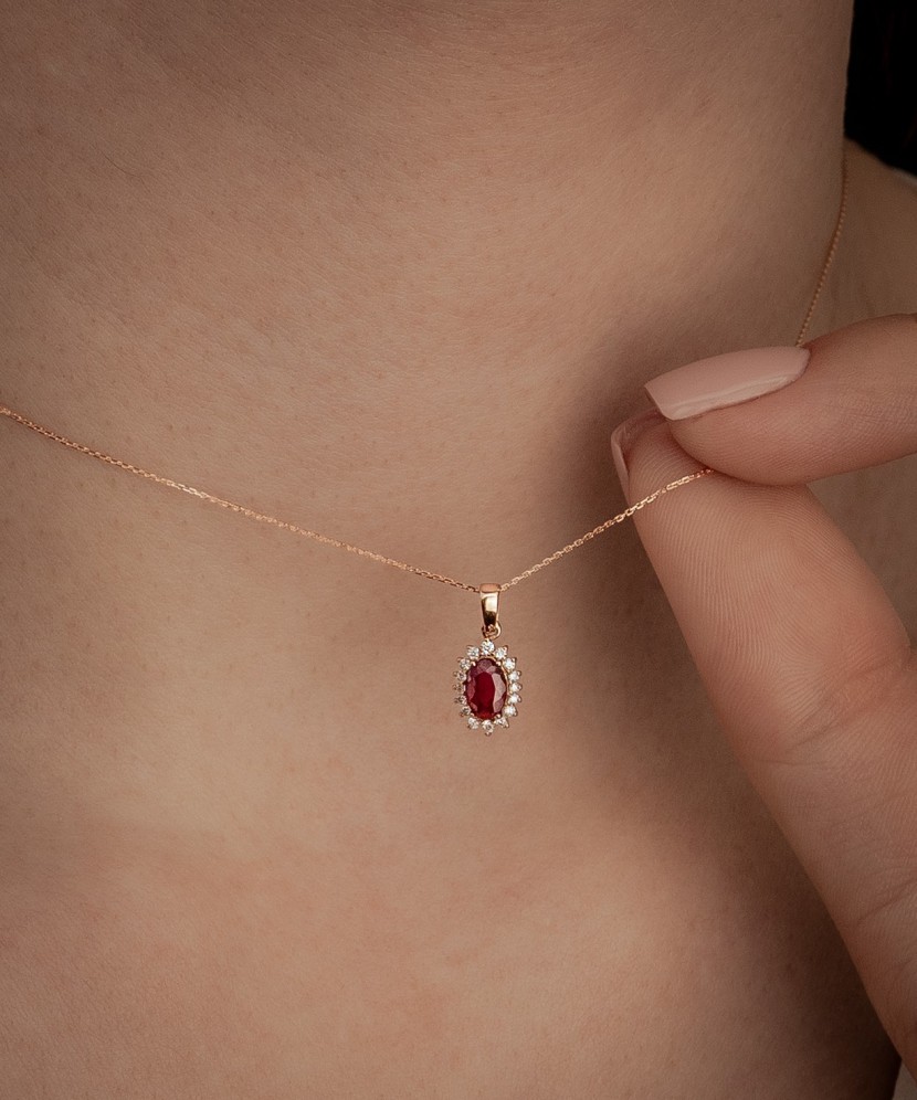 Gold chain with ruby and diamond pendant