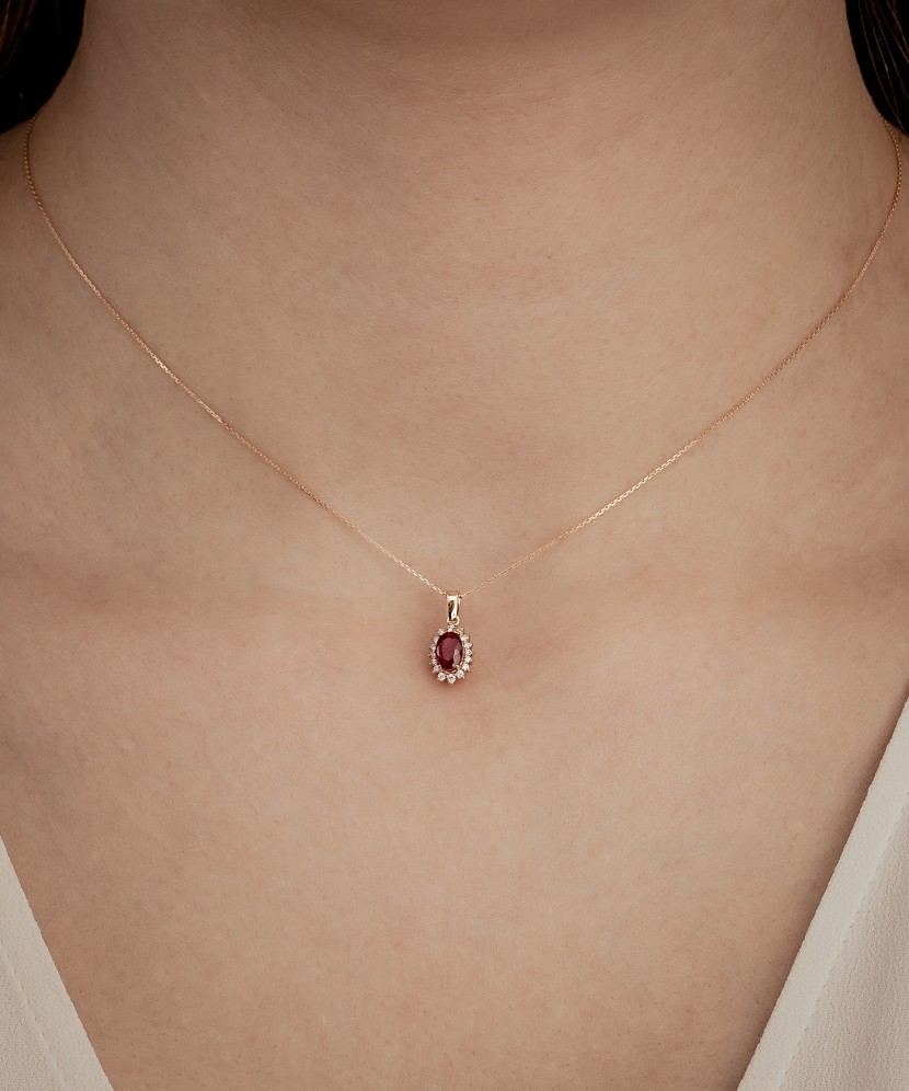 Gold chain with ruby and diamond pendant