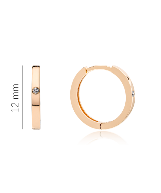 Kultaiset korvakorut timanteilla