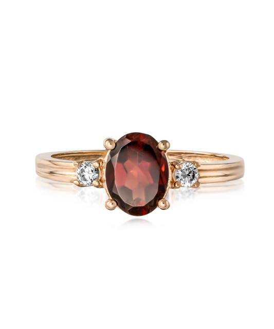 Gold ring with garnet and zircons