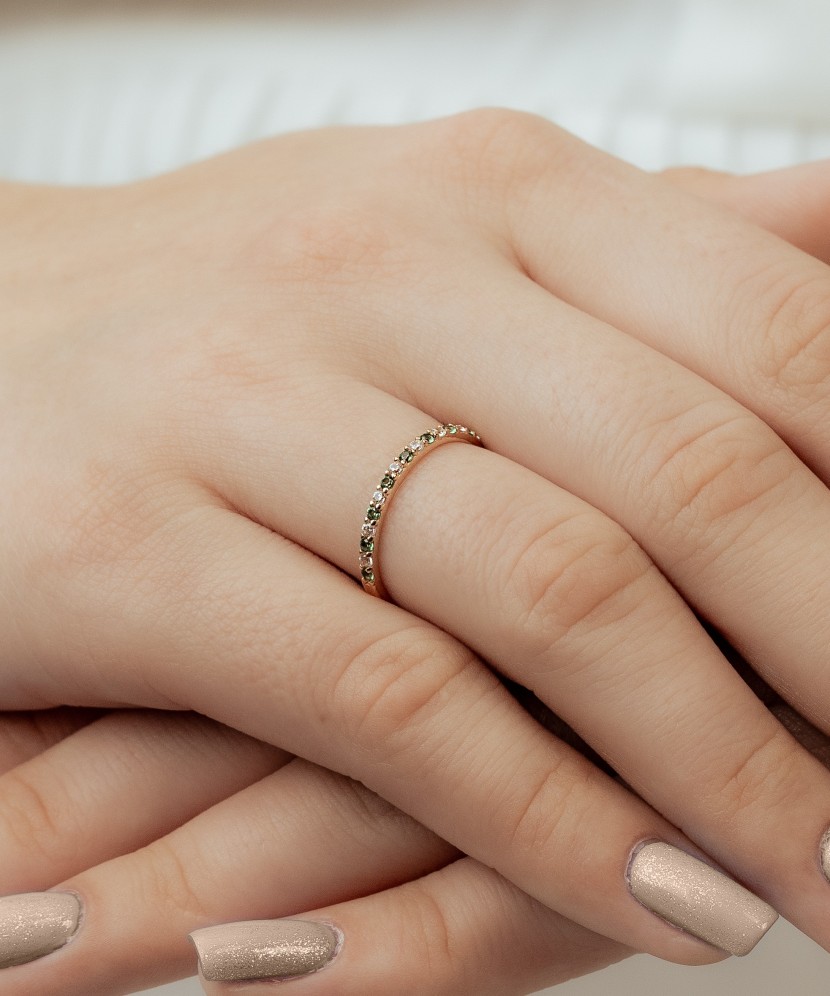 Gold ring with zircons