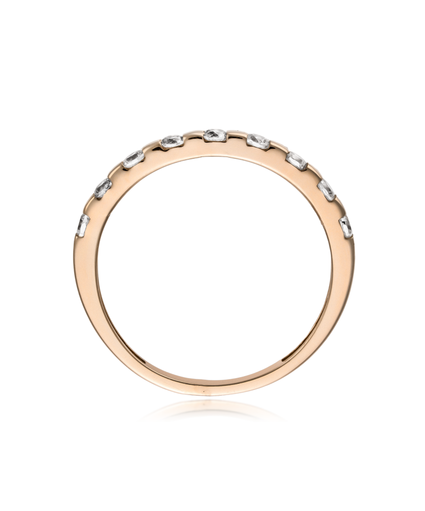 Gold ring with zircons