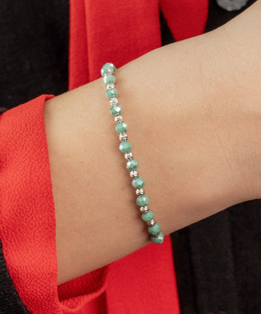 Black string bracelet with silver and onyxes