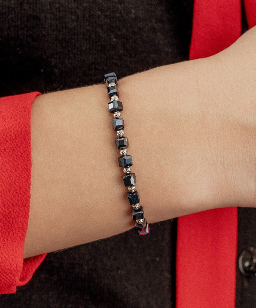 Black string bracelet with silver And Hematites