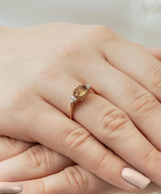 Gold ring with sultanite and zircons