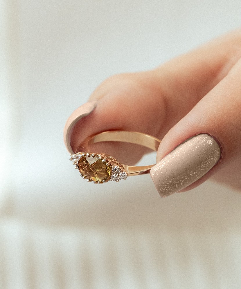 Gold ring with sultanite and zircons